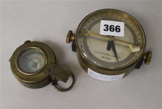 A telegraph works compass and a World War II compass